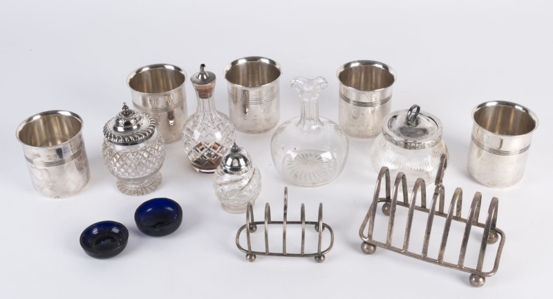 Silver, crystal and silver plated ware including toast racks, beakers, condiments, bottles and jars, 19th and early 20th century, the tallest 15cm high