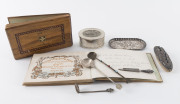 Sterling silver manicure dish, buff and file, Egyptian silver spoons, jewellery box and souvenir books of Jerusalem,19th and early 20th century, the dish 12cm across