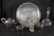 Silver plated tea service, tray, decanter and atomizer, 20th century, the tray 38cm across