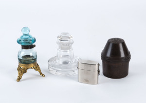 A small collection of inkwells comprising a bakelite "Onoto the Ink" sealable bottle carrier, a plated metal travelling inkwell with original glass interior, a European Turquoise glass and brass inkwell and a glass inkwell with stopper. (4 items).