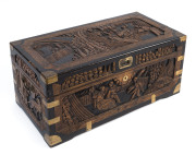 A Chinese carved camphorwood blanket box, circa 1950, 33cm high, 76cm wide, 38cm deep