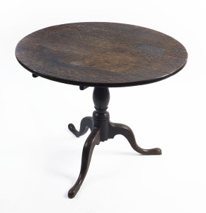 A Georgian oak tilt top occasional table, circa 1780, 69cm high, 83cm diameter