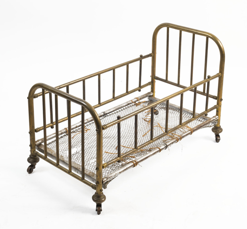 A Victorian brass bed, 19th century, 65cm long