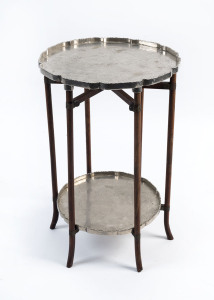 A Chinese two tier occasional table with silver plated tops and folding base, circa 1920, 54cm high, 38cm across