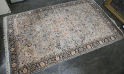 A fine cotton and silk Persian rug, 300x182cm
