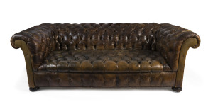 An antique Chesterfield settee upholstered in leather, 19th century, 200cm across the arms