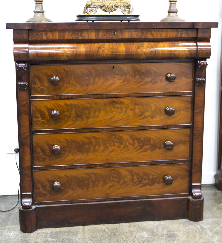 An English flame mahogany five drawer chest, circa 1865, 134cm high, 129cm wide, 61cm deep