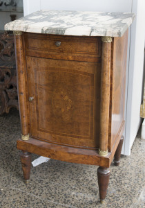 A French bedside pot cabinet with marquetry inlay, ormolu mounts and marble top, early 20th century, 81cm high, 48cm wide, 40cm deep