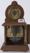 A German musical clock with 4½" disc player accompanied by approximately 45 discs, late 19th century, 32cm high - 2