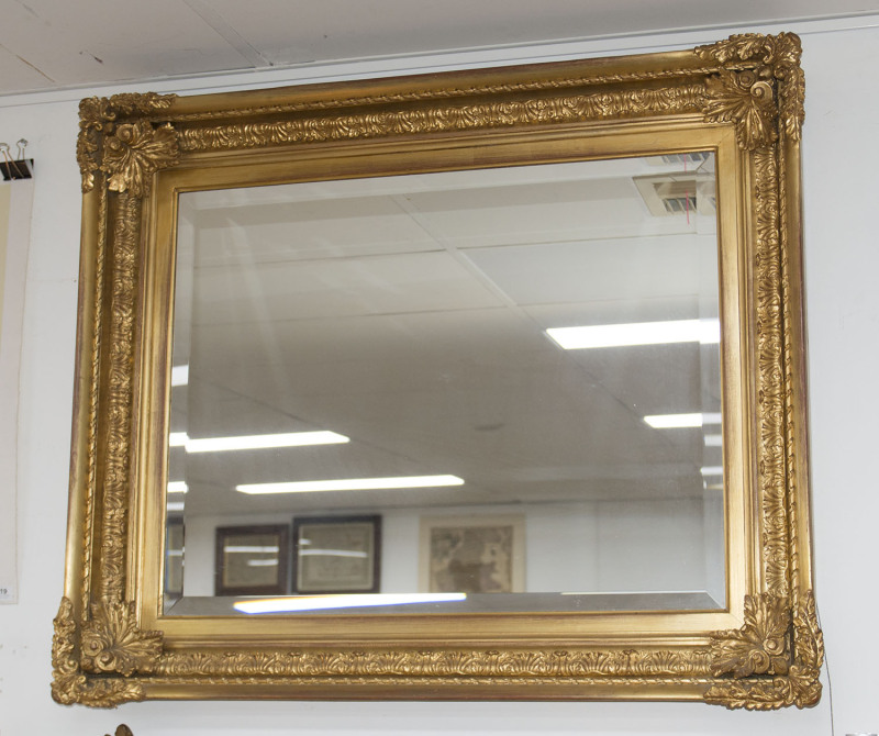 A very fine English gilt frame with later beveled mirror, circa 1865, 91 x 109cm