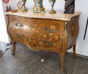 A French marquetry bombe commode with marble top, early 20th century, 84cm high, 128cm wide, 52cm deep