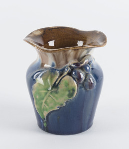 REMUED Pottery vase with applied grapes and leaf, incised "Remued, 169M", 9.5cm high