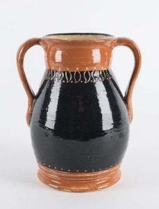 Australian pottery vase with sgraffito gumleaf decoration, signed "R" on the base, 19cm high