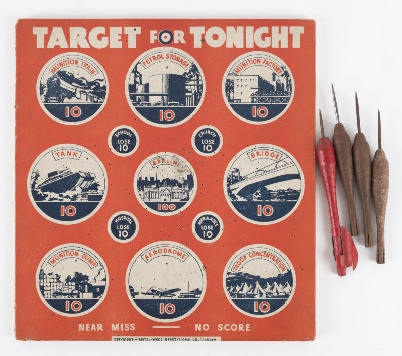 "TARGET FOR TONIGHT" WW2 period dart board and 4 bomb shaped darts, by Metal-Wood Repetitions Co. Sydney, ​29 x 27cm