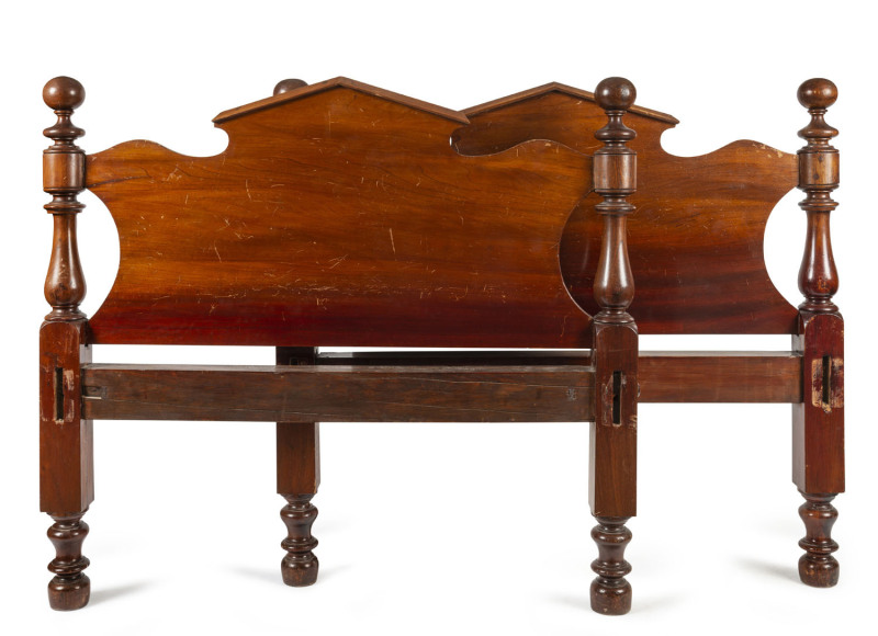 A Colonial cedar and blackwood double bed with original rails, bolts and key, mid 19th century, illustrated in "Australian Furniture Pictorial History And Dictionary, 1788-1938" by Fahy and Simpson, page 142, plate 5 122cm high, 135cm wide, 204cm long