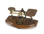 Set of antique scales with three brass weights, 19th century, ​18cm across