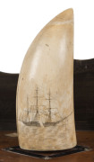 A Colonial scrimshaw desk set comprising of two sperm whale teeth engraved with tallships standing on a baleen and timber base inlaid with mother of pearl and tortoiseshell and adorned with whale bone. The baleen back plate engraved with a fine architectu - 2