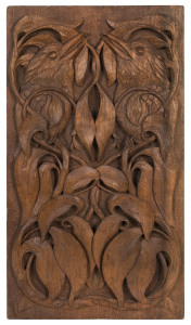 An Australian Queensland maple plaque carved with laughing kookaburras surrounded by gum leaves, early 20th century, ​46 x 26cm