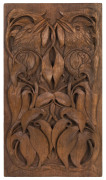 An Australian Queensland maple plaque carved with laughing kookaburras surrounded by gum leaves, early 20th century, ​46 x 26cm