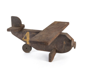 Depression era primitive toy plane, painted wood, circa 1930s, ​32cm long,