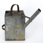 A tinware watering can, 19th century, 45cm high PROVENANCE: Private Collection Bendigo