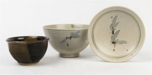 Three Australian studio pottery bowls with impressed maker's marks, circa 1970s, the largest 26cm diameter