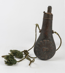 A copper and brass powder flask, 19th century, 21cm high