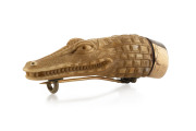 A crocodile brooch, carved bone and rose gold, 19th century, ​5cm long