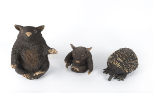 PETER DELAHENTY "Wildlife Sculpture" echidna and two wombat ceramic sculptures, late 20th century, the largest 35cm long
