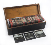 WESTERN AUSTRALIA: Box of glass plate slides, many with captions showing scenes of mining, farming, forestry, social scenes and landscapes, early 20th century, (95+ items)