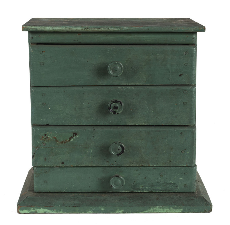 An Australian miniature four drawer chest with green painted finish, early 20th century, 29cm high, 30cm wide, 16cm deep