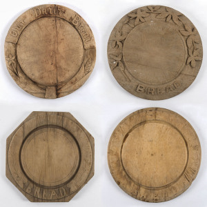 Four Australian bread boards, carved kauri pine, South Australian origin, 19th century, 29cm diameter