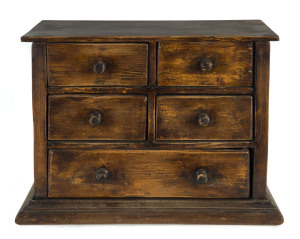 A miniature chest of five drawers, stained pine, early 20th century, ​27cm high, 36cm wide, 19cm deep