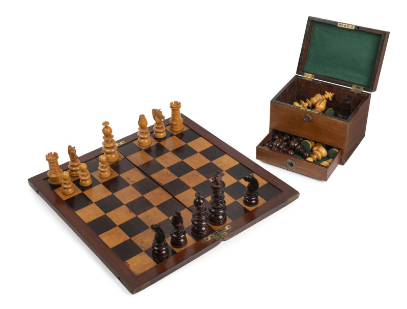 A rare turned timber chess set and board, 19th century, the kings 15cm high