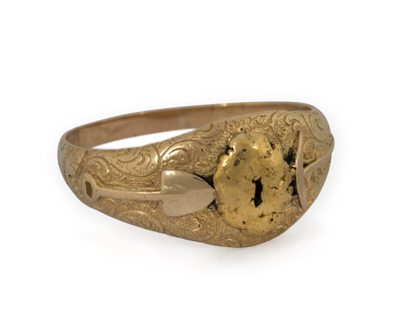 EDWARD SCHAFER rare and early goldminer's ring, 15ct yellow gold with gold nugget specimen flanked by a pick and shovel, circa 1850s, stamped with a gothic "E.S." with kangaroo and emu and early Schafer mark possibly pre-dating his Melbourne business and