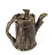 WILLIAM RICKETTS pottery teapot of tree stump form with applied gum leaves and nuts with branch handle, inscribed "Wm. Ricketts, Potters Sanctuary Mt. Dandenong, 1936", 17cm high - 2