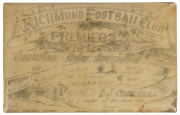 THE CHANGI PRISON AUSTRALIAN RULES ASSOCIATION PREMIERSHIP TROPHY PLAQUE, 1942 the hand-lettered and illustrated cardboard trophy laid down on metal backing and with a later plastic protector, inscribed in pencil "RICHMOND FOOTBALL CLUB, PREMIERS, 1942, A