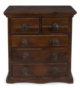 A miniature chest of 5 drawers, stained pine with brass knobs, 19th century, ​28cm high