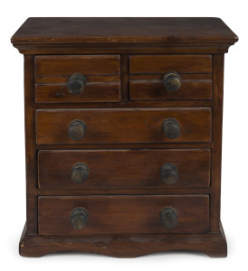 A miniature chest of 5 drawers, stained pine with brass knobs, 19th century, 28cm high