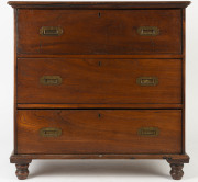 An unusual Australian cedar three drawer chest with inset campaign handles and finely turned legs, early to mid 19th century, 90cm high, 92cm wide, 48cm deep