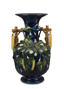 A Colonial pottery vase with applied sweet pea decoration, 19th century, ​39.5cm high