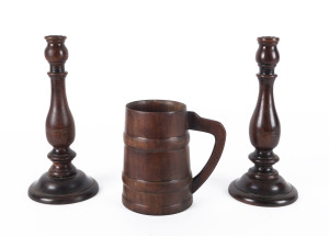 An Australian cedar pint tankard and pair of cedar candle sticks, 19th and early 20th century, the tankard 15cm high