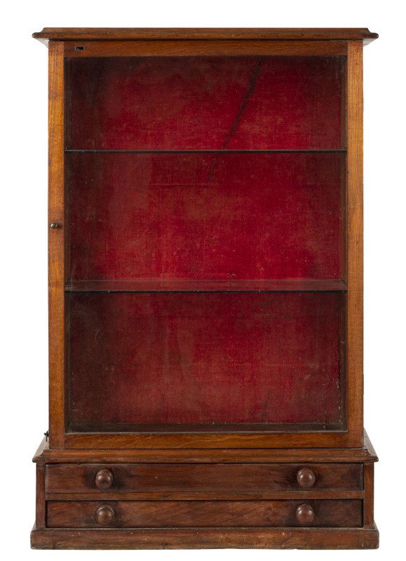 An Australian cedar display cabinet with two drawers in the base, 19th century, 78cm high, 52cm wide, 24cm deep