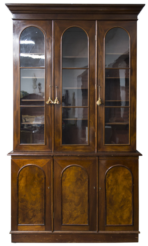 An Australian three door bookcase, cedar, 19th century, ​249cm high, 142cm wide, 44cm deep