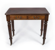A hall table with two drawers and porcelain castors, blackwood and kauri pine, circa 1890, 76cm high, 84cm wide, 46cm deep