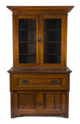 An Australian walnut secretaire bookcase, circa 1900, 233cm high, 126cm wide, 56cm deep