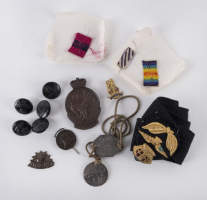 Qantas co-founder P.J. McGINNESS' WWI military service memorabilia comprising Anzac Medal inscribed 'P.J. McGINNESS' with presentation box, plus Anzac lapel badge, dog tags, hatband, buttons, patches, and Saoirse Creidim 1829-1929 Liberty Bell pin.