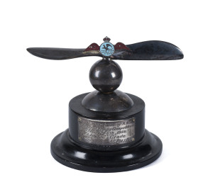 8th Feb. 1935 Aero Club of NSW 1st Prize Award: Silver Propellor with Blue Enamel Aero Club of New South Wales Logo mounted on a plinth. Engraved on a silver plaque on the plinth: "Royal Aero Club of NSW General Flying Competition - February 8th 1935: Adv