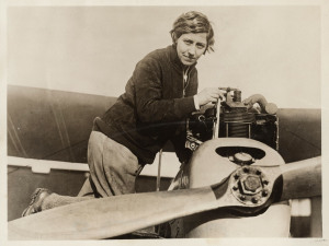 AMY JOHNSON'S FLIGHT FROM ENGLAND TO AUSTRALIA A Columbia 78rpm recording of Amy Johnson talking about her flight 'The Story of My Flight,' recorded in Sydney in 1930. and signed A. Johnson on the label; a press photo, with citation describing Johnson as 