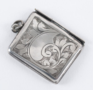 Stamp Boxes - Silver: 1906 single-size case in the form of a small envelope (26x23mm) with floral engraved decoration on front & reverse, weight 4gr, hallmarked in Chester, maker not known, somewhat compressed, of fine appearance.